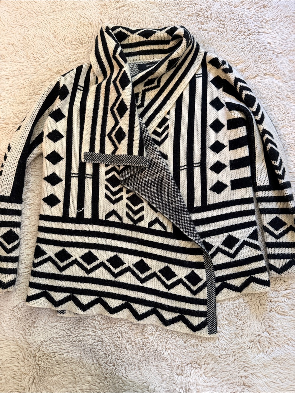Geometric pattern wrap sweater